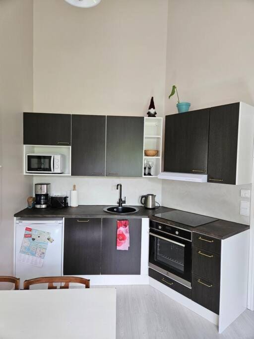 Kitchen or kitchenette, oven, stove, toaster