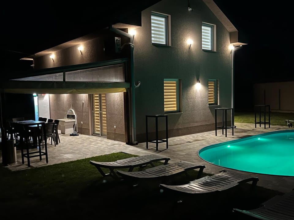 Property building, Night, Swimming pool