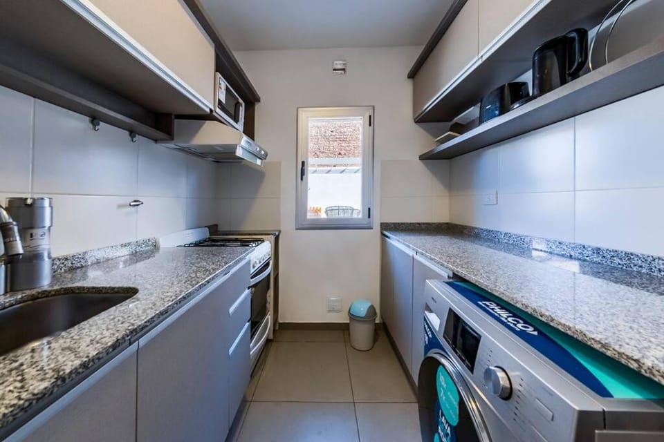 Kitchen or kitchenette, washing machine