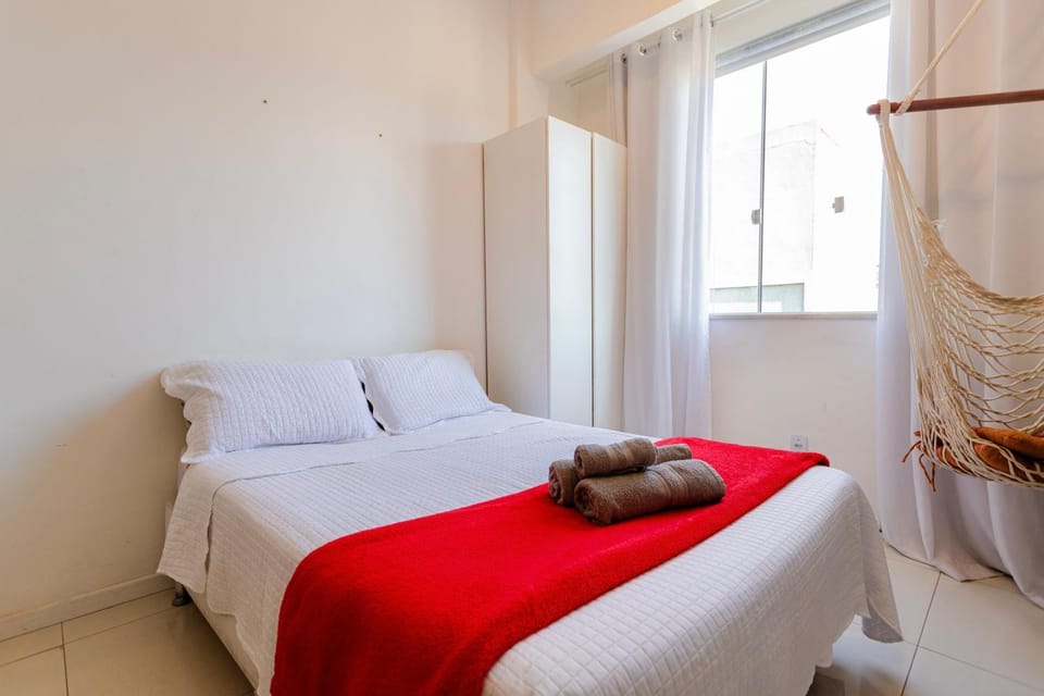 Bed, towels, wardrobe