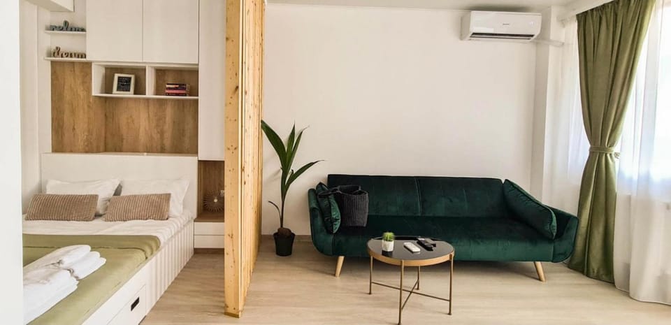 Bed, Living room, Photo of the whole room, Seating area, towels, air conditioner