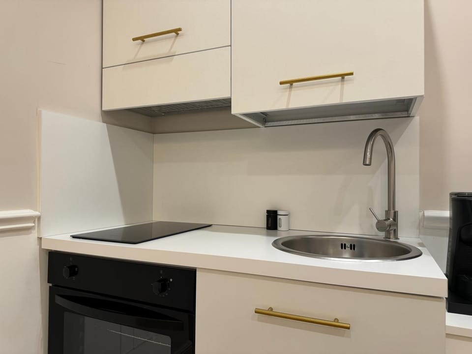 Kitchen or kitchenette, stove