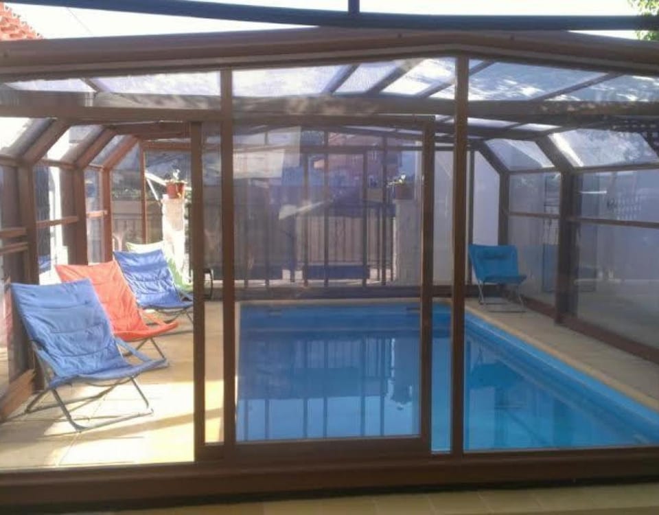 Property building, Living room, Swimming pool