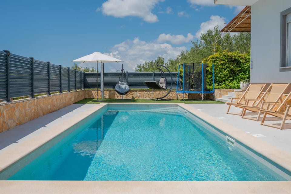 Patio, Children play ground, Pool view, Swimming pool, sunbed