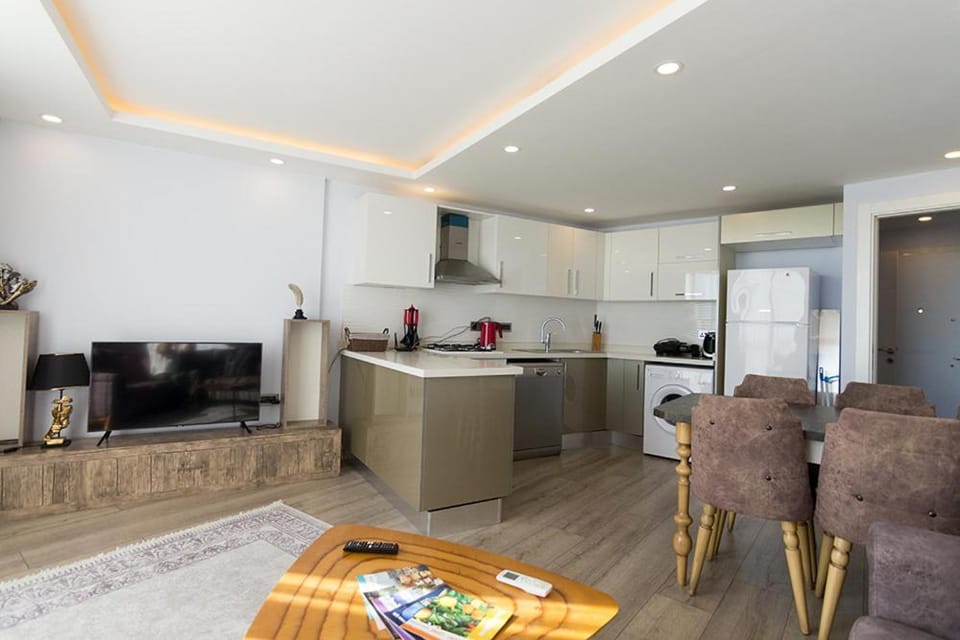 TV and multimedia, Kitchen or kitchenette, Living room, Seating area, Dining area, dishwasher, oven, stove
