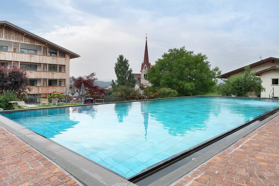 Property building, Living room, Swimming pool