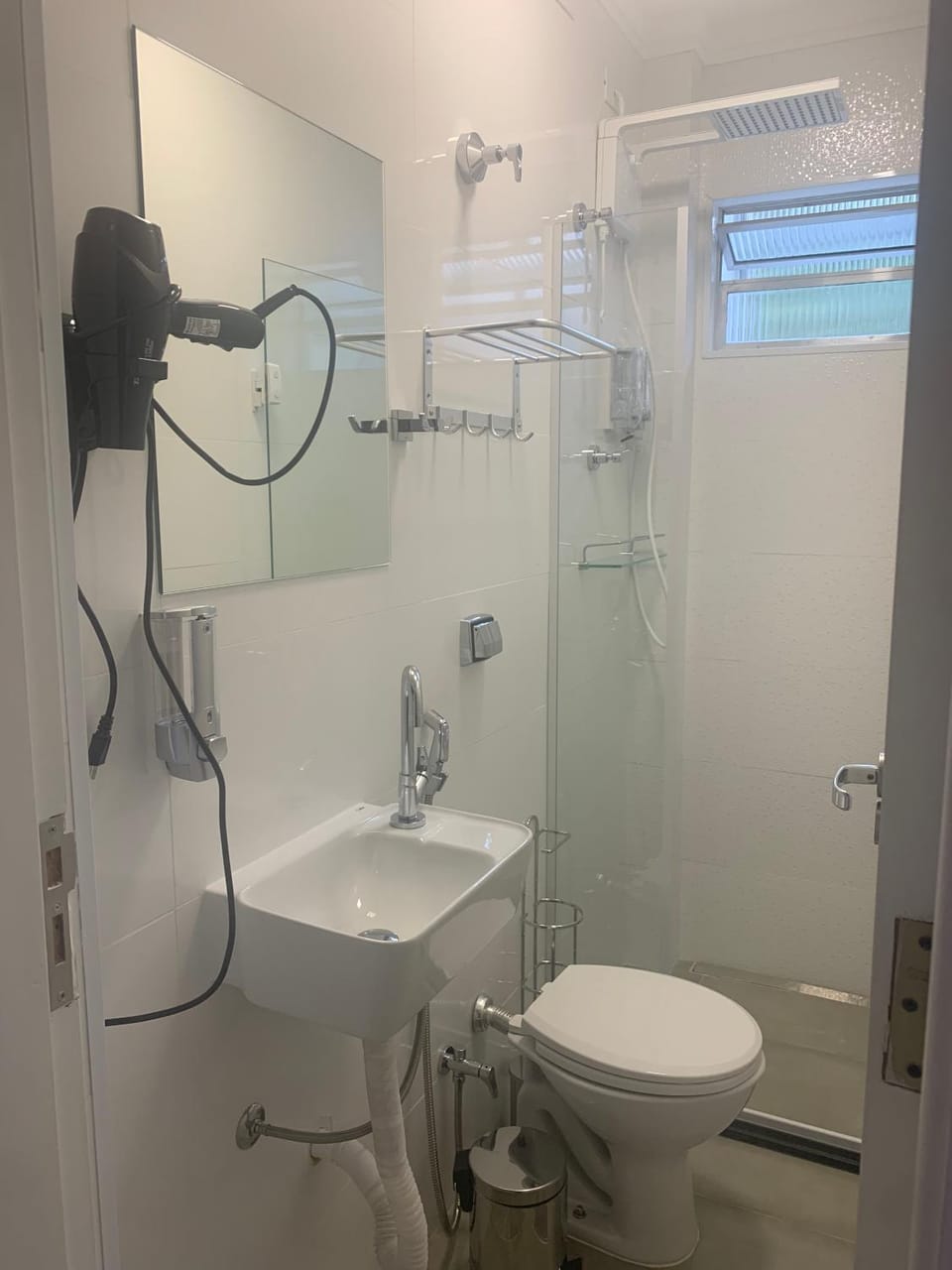 Shower, Toilet, Bathroom, hair dryier, towels