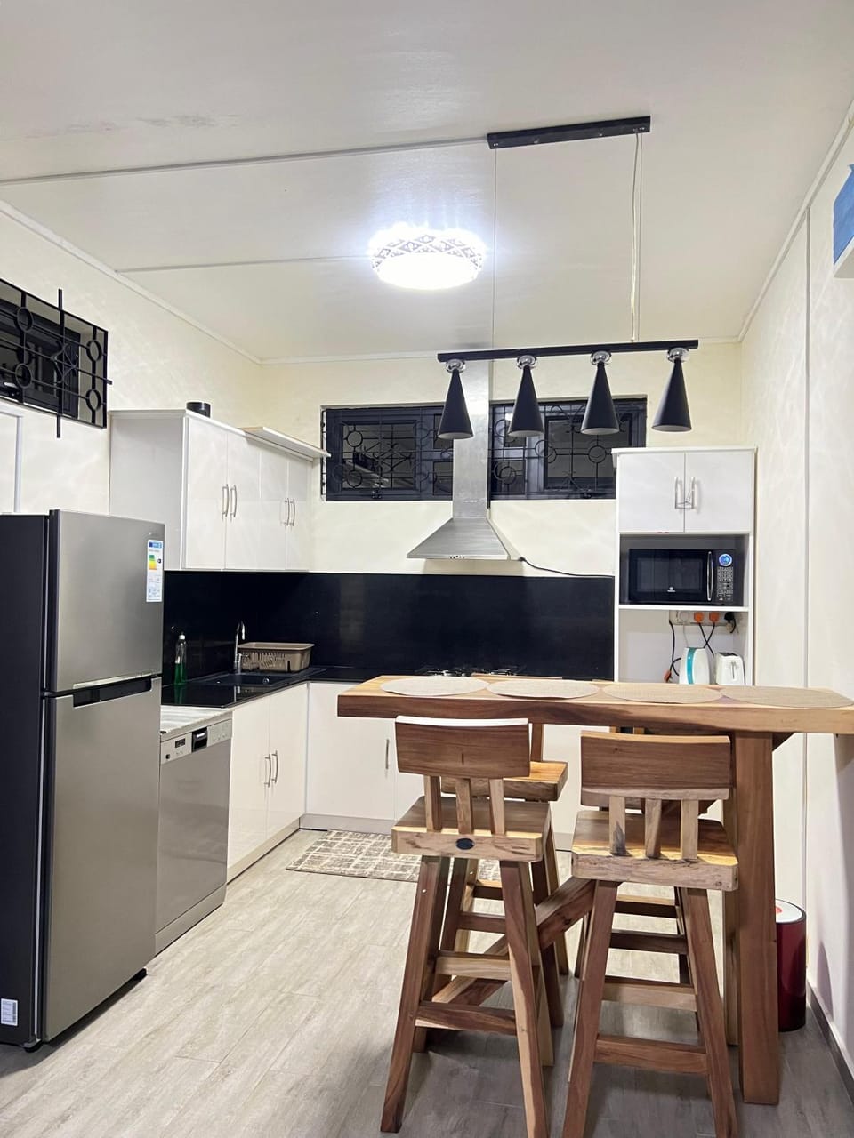 Kitchen or kitchenette, Dining area, dishwasher, microwave, oven, stove