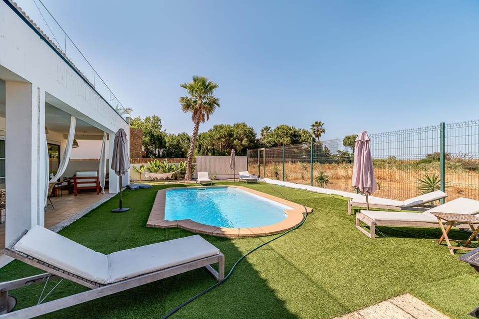 Property building, Living room, Swimming pool