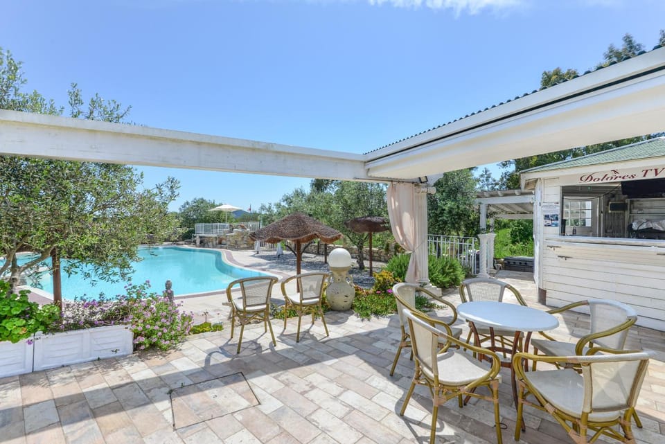 Property building, Living room, Swimming pool