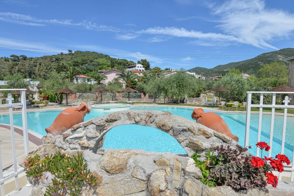 Property building, Living room, Swimming pool