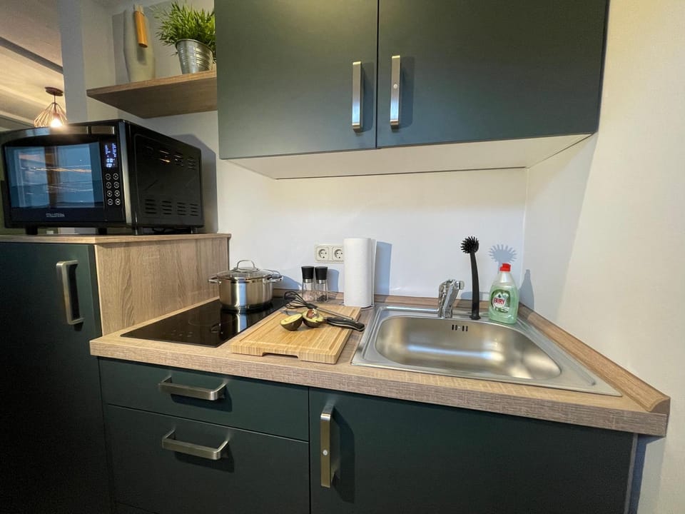Kitchen or kitchenette, stove