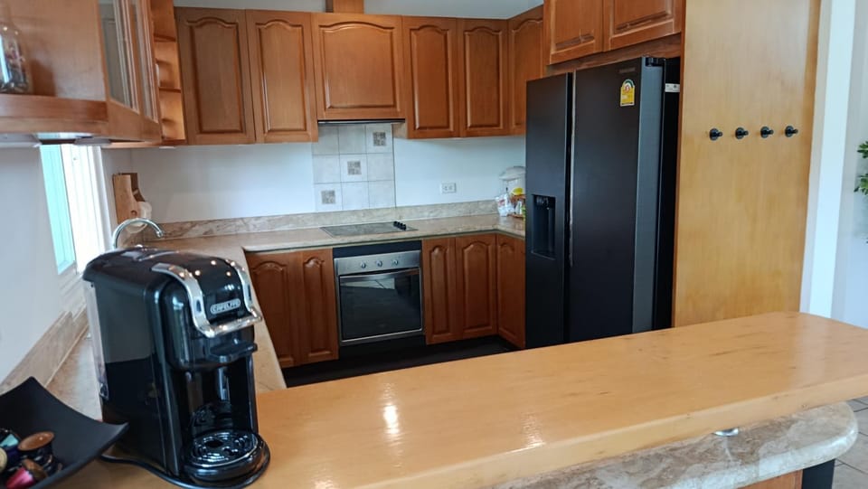 Kitchen or kitchenette, oven, stove, toaster