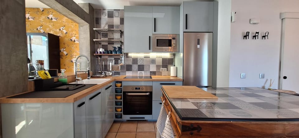 Kitchen or kitchenette, oven, stove