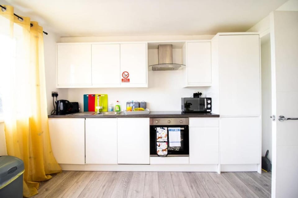 Kitchen or kitchenette, oven, stove, toaster