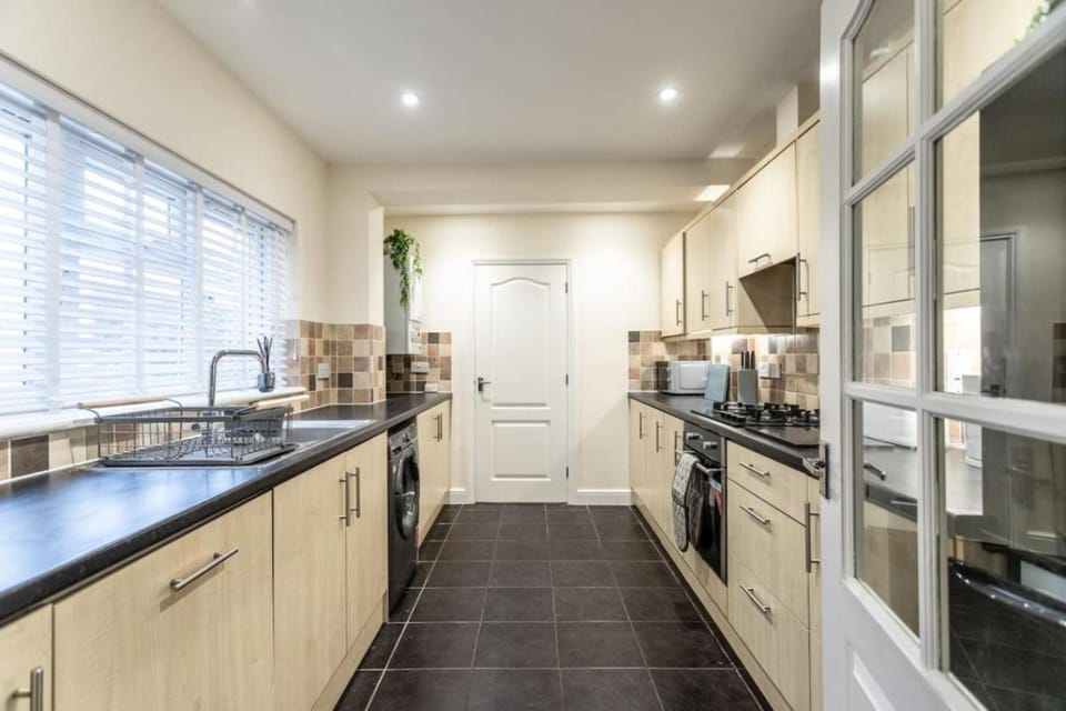 Kitchen or kitchenette, oven, stove, toaster