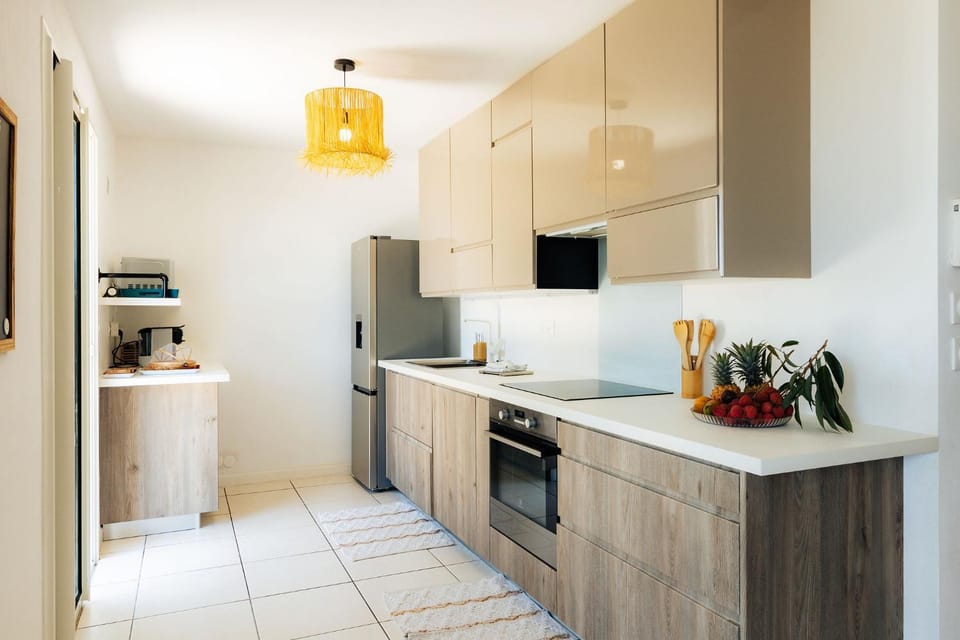 Kitchen or kitchenette, dishwasher, oven, stove
