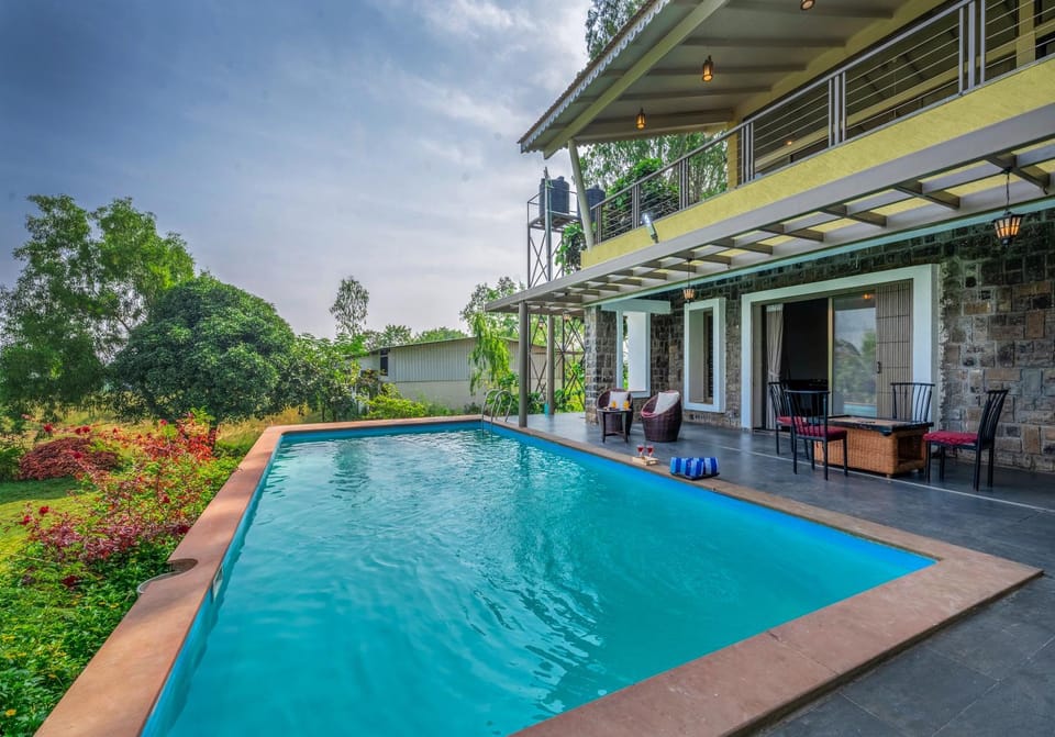 Property building, Patio, Day, Garden, View (from property/room), Seating area, Garden view, Pool view, Swimming pool