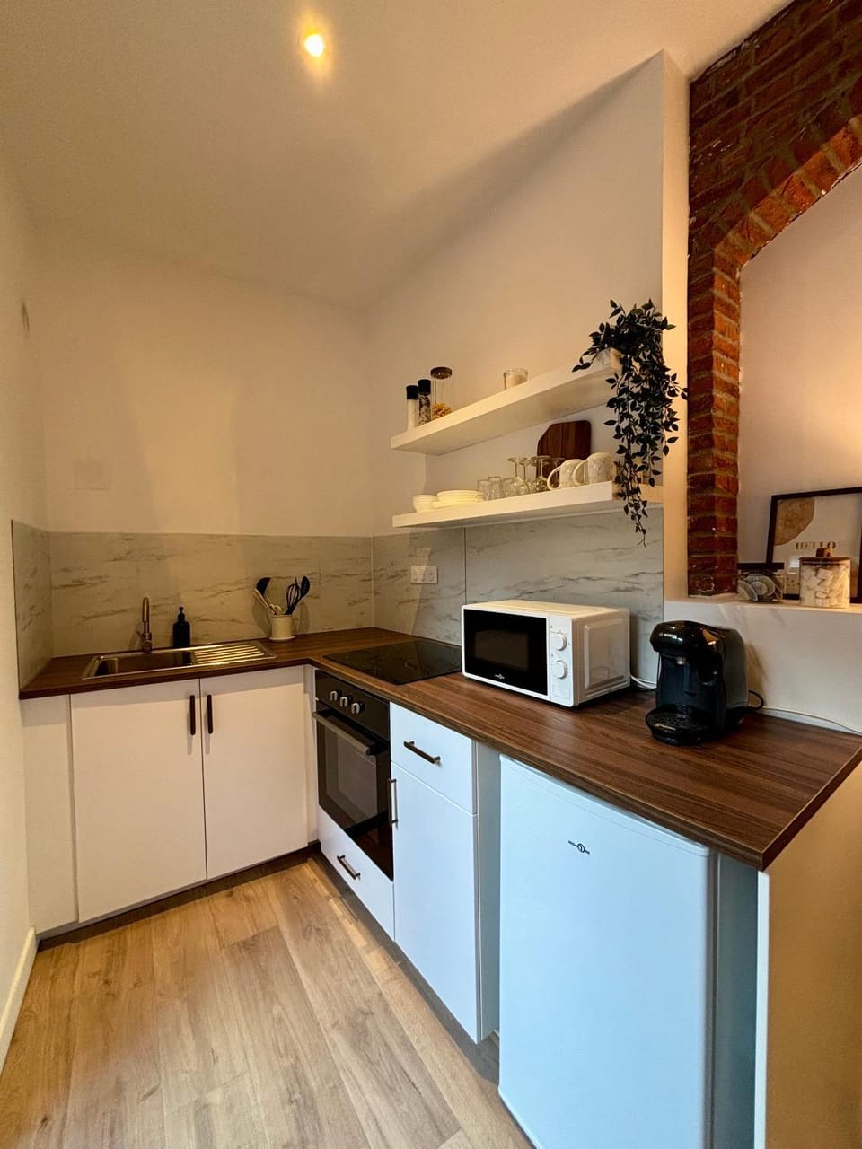 Kitchen or kitchenette, oven, stove