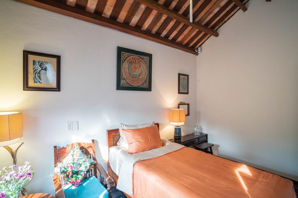Bed, Living room, Seating area, Bedroom