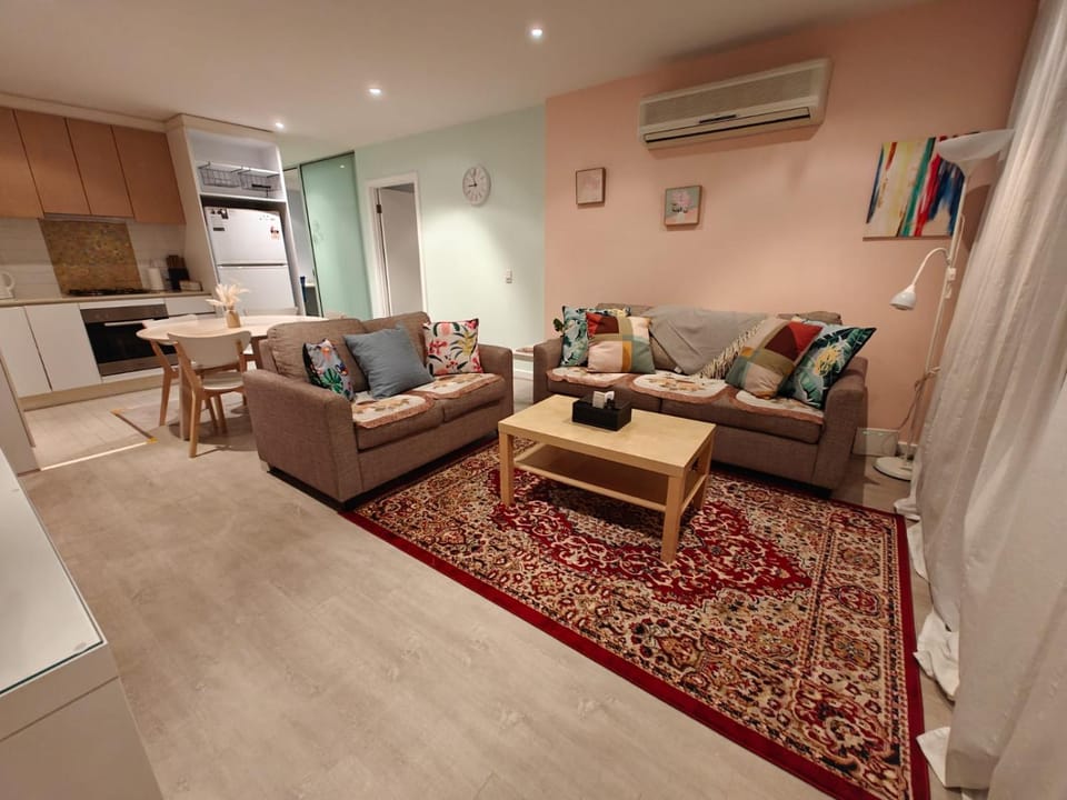 Kitchen or kitchenette, Living room, Seating area, Dining area, oven, stove, air conditioner