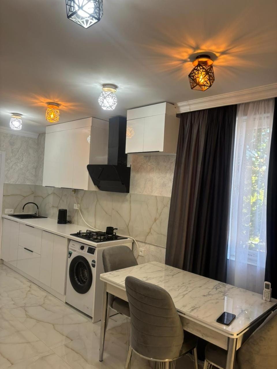 Kitchen or kitchenette, Living room, Seating area, Dining area, stove, washing machine
