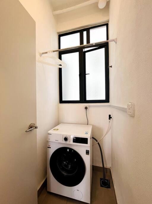 Photo of the whole room, washing machine