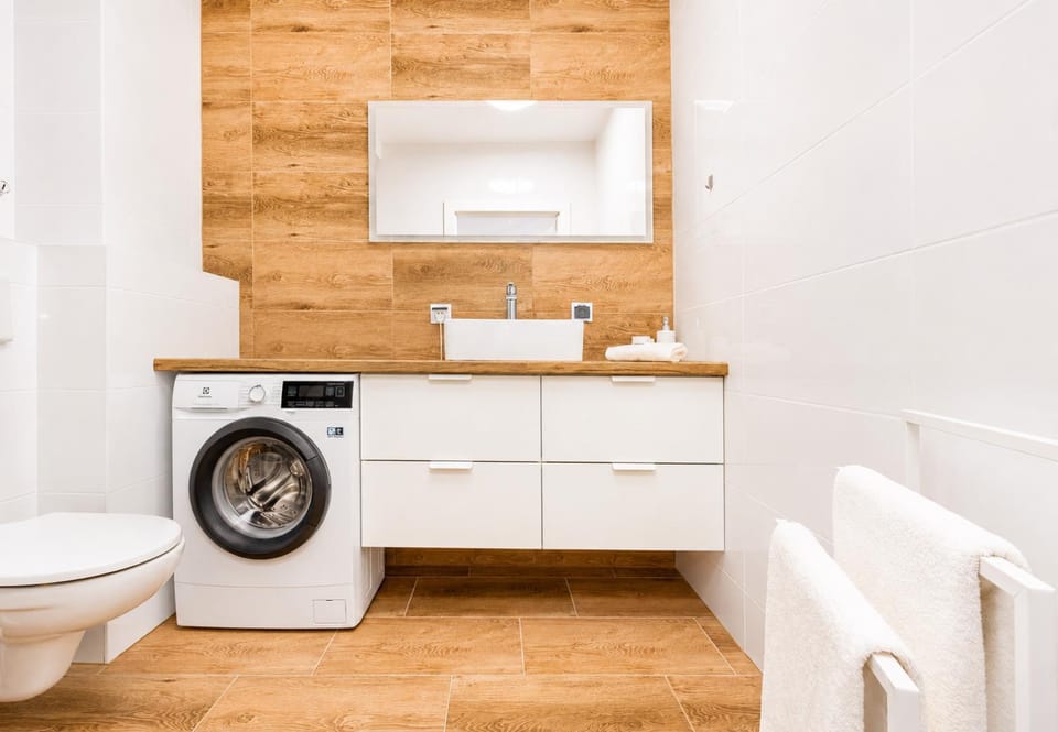 Shower, Toilet, Bathroom, towels, washing machine, dryer