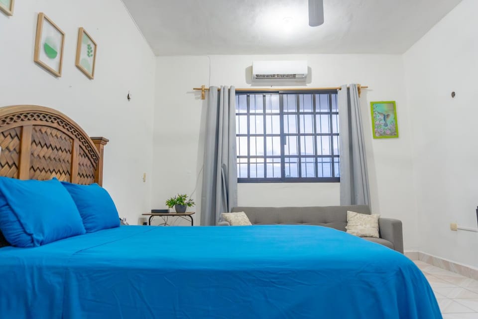 Photo of the whole room, air conditioner