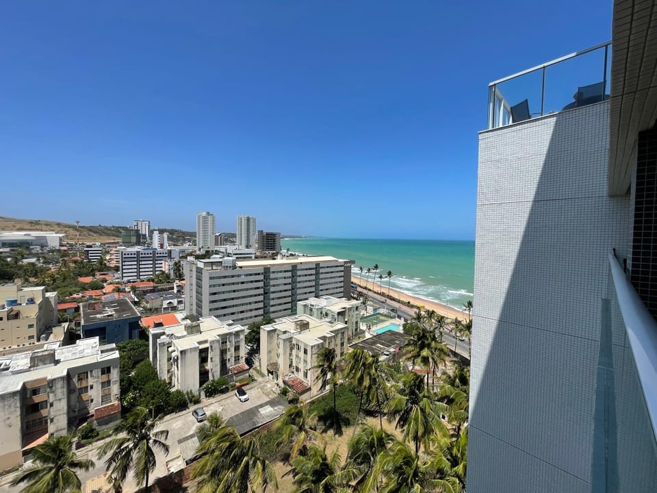 Property building, Nearby landmark, Day, Natural landscape, View (from property/room), Balcony/Terrace, Beach, City view, Sea view