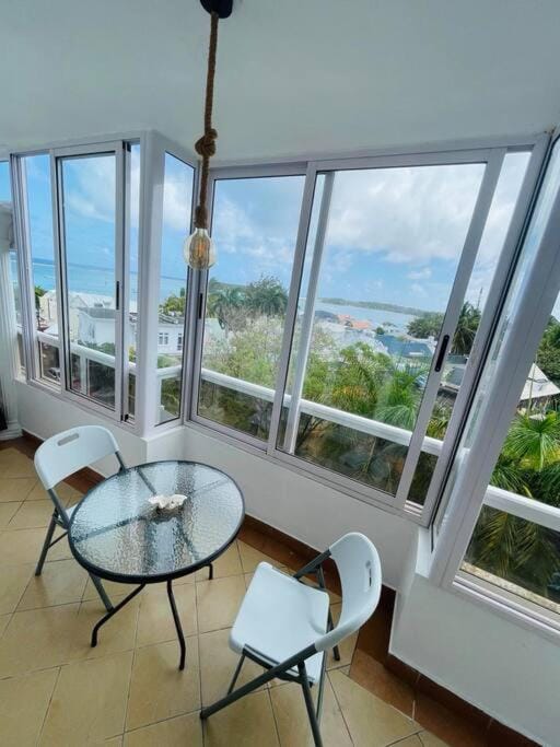 View (from property/room), Balcony/Terrace, Seating area, Dining area, Sea view