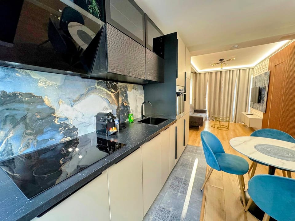Coffee/tea facilities, Living room, Food, dishwasher, oven, stove, kitchen