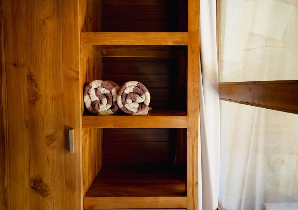bunk bed, towels, wardrobe