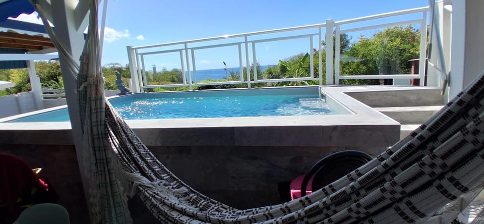 Gîtes Capra Pomme Surette piscine et spa House in Bouillante