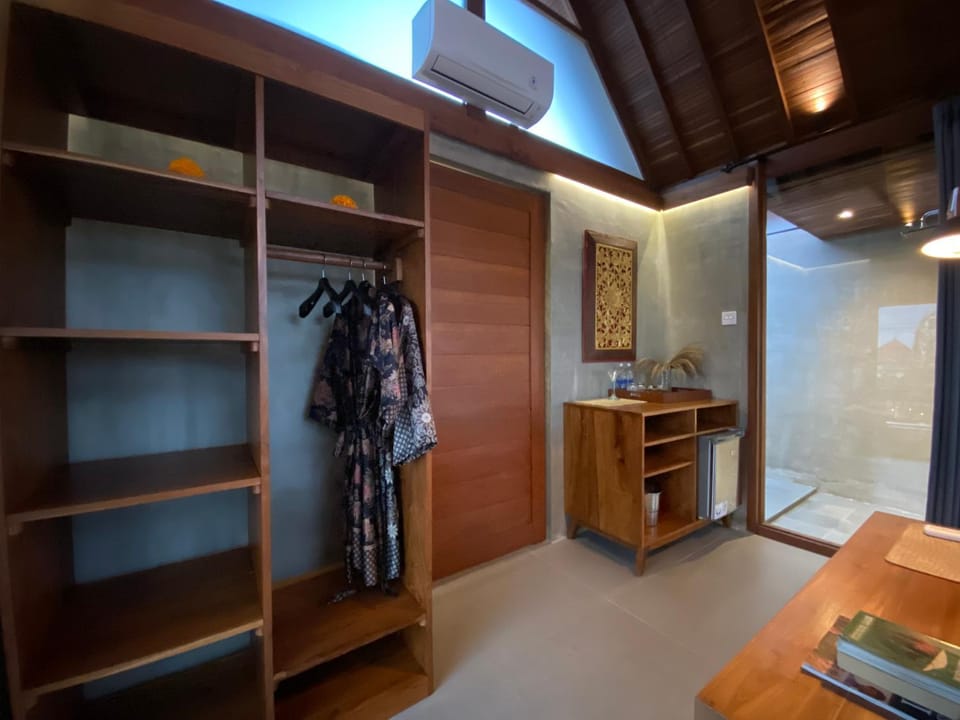Photo of the whole room, oven, wardrobe, air conditioner