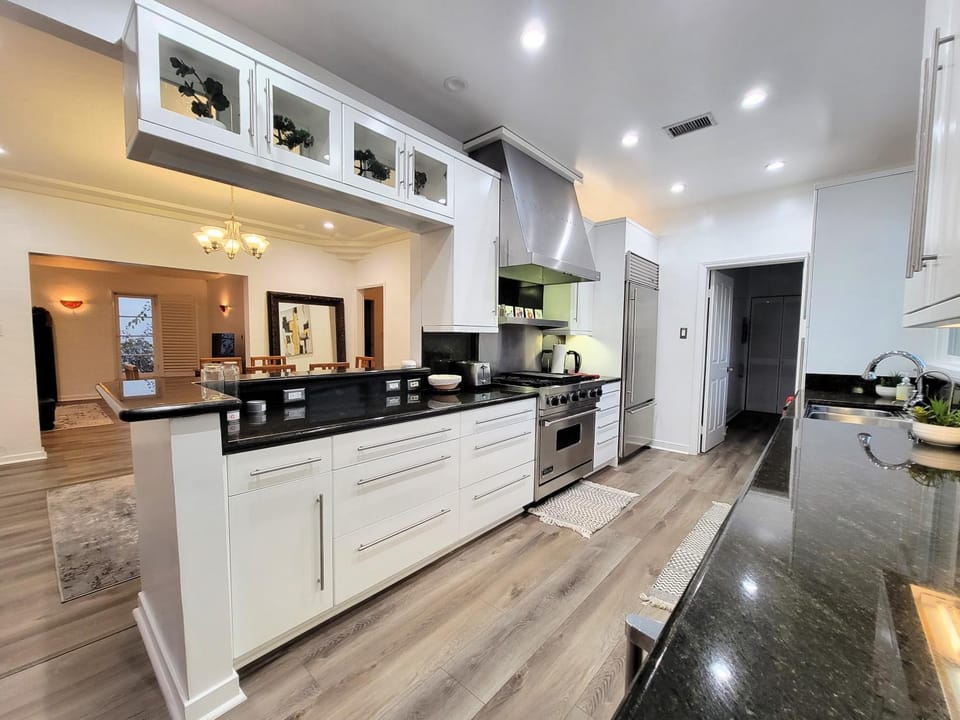 Kitchen or kitchenette, dishwasher, oven, stove, toaster