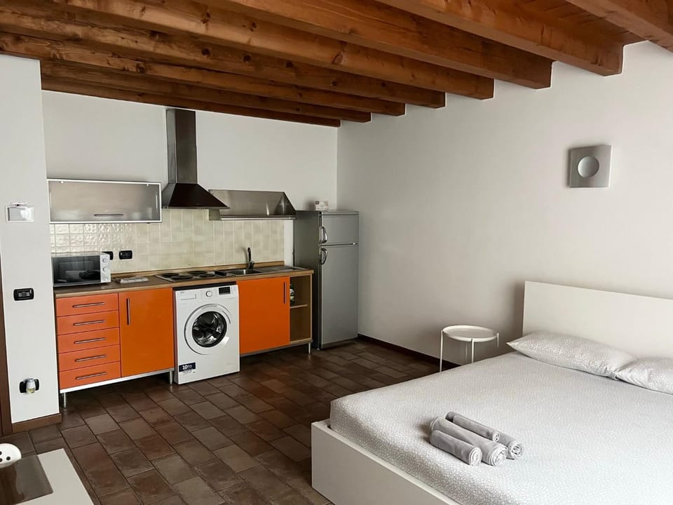 Kitchen or kitchenette, washing machine