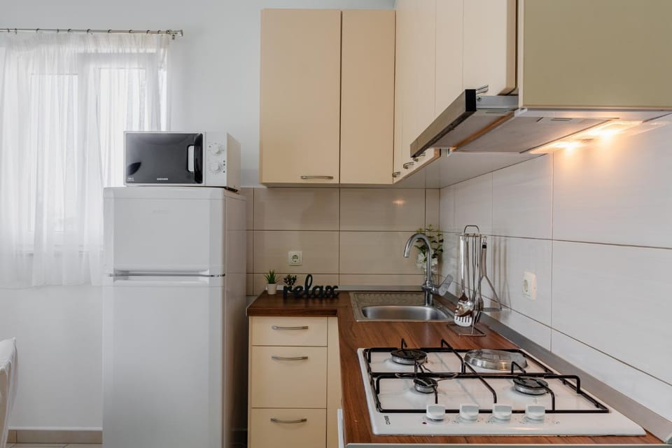 Kitchen or kitchenette, stove, toaster