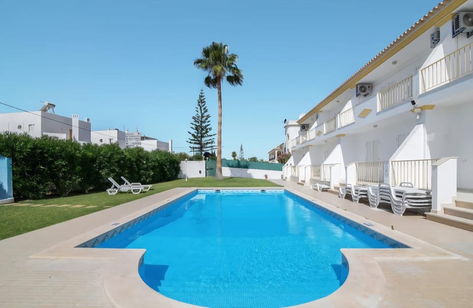 Property building, Living room, Swimming pool