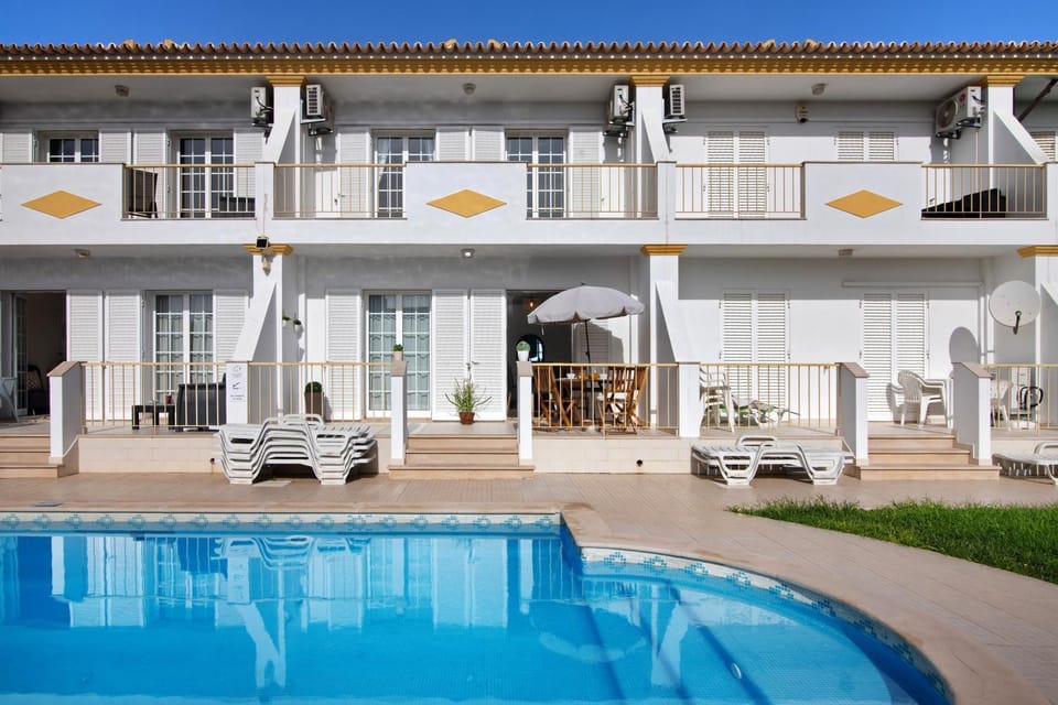 Property building, Living room, Swimming pool