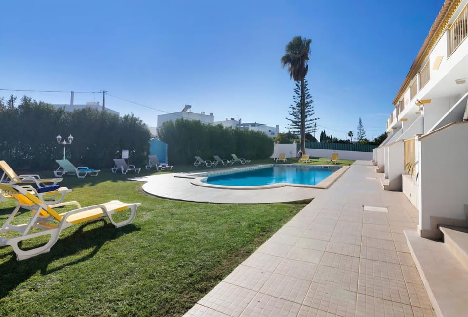 Property building, Living room, Swimming pool