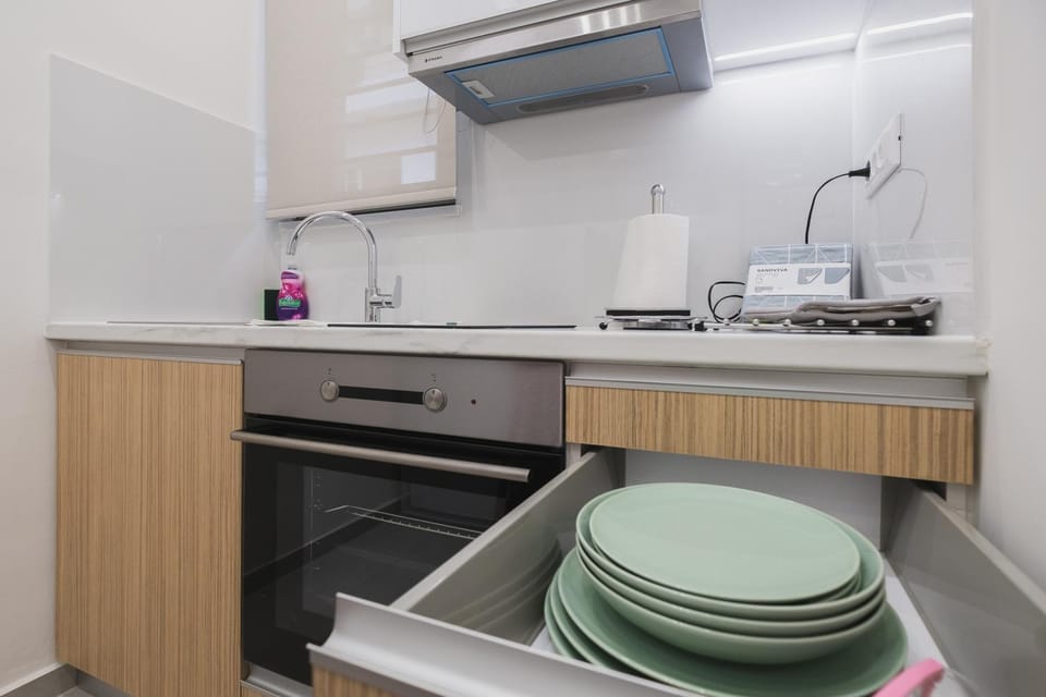 Kitchen or kitchenette, oven, stove