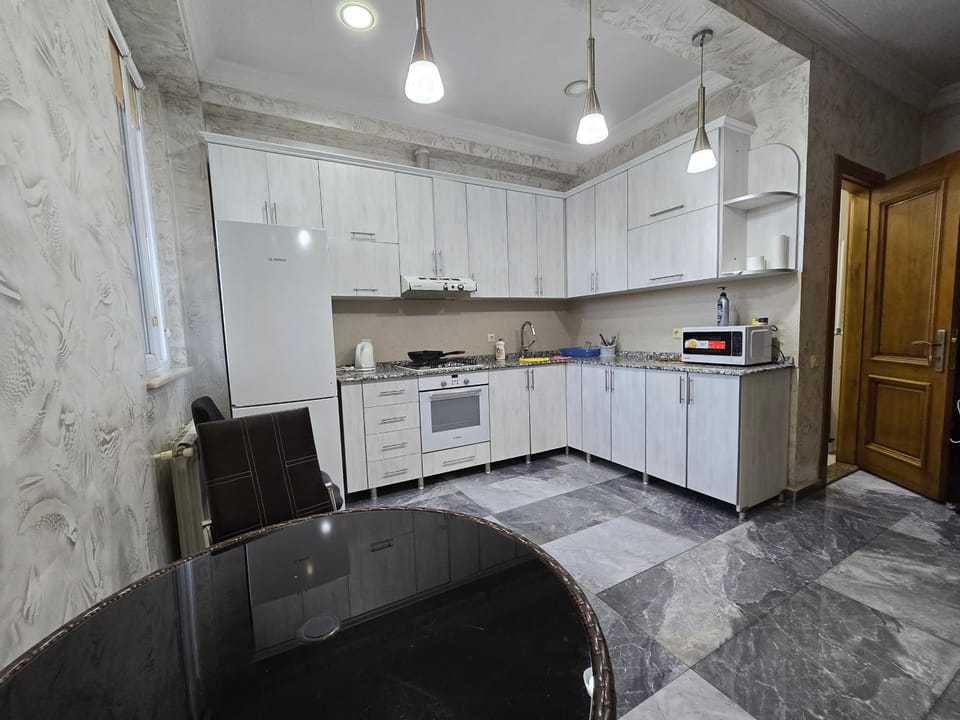 Kitchen or kitchenette, oven, stove