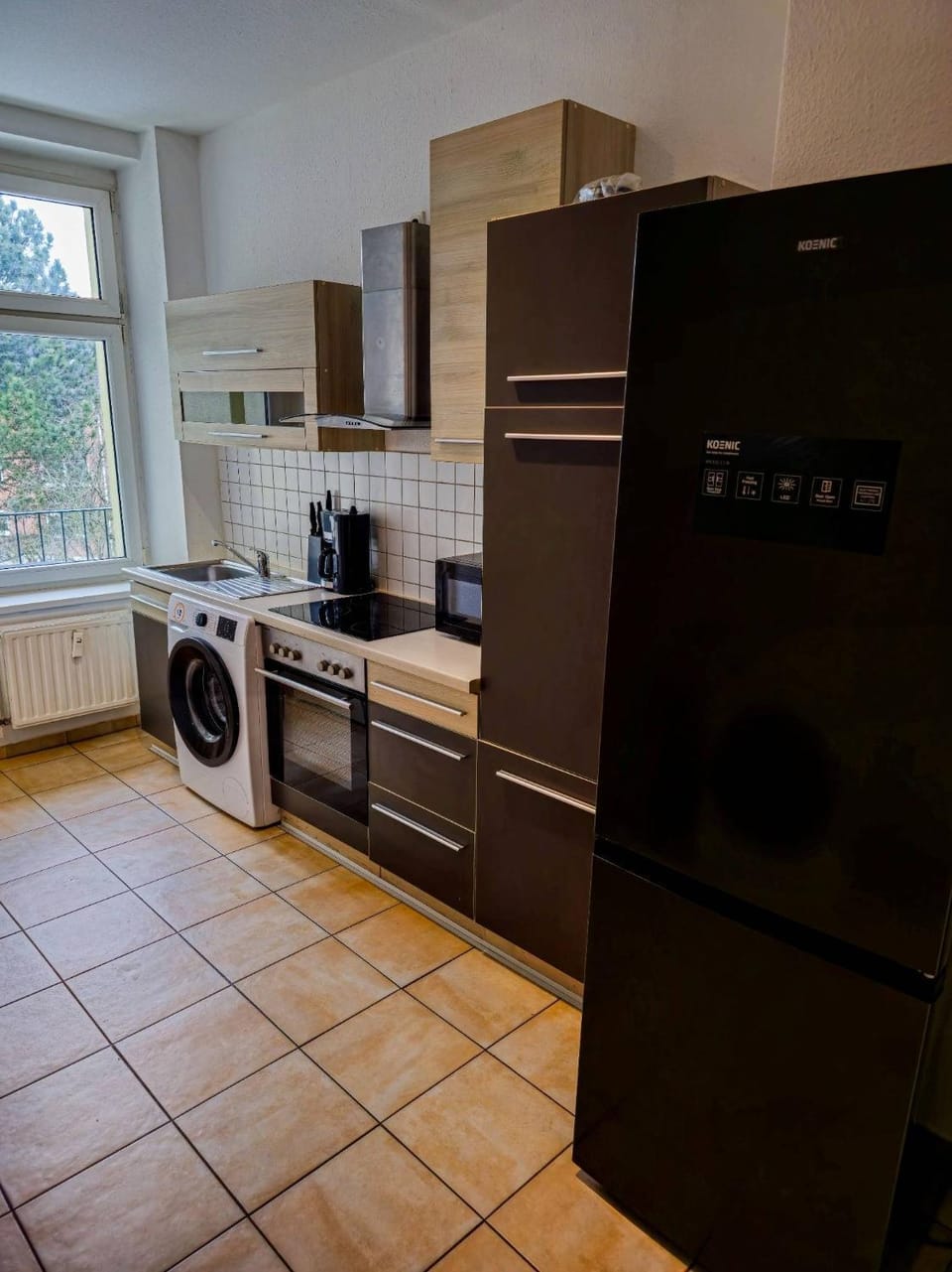 Coffee/tea facilities, Kitchen or kitchenette, stove, toaster, washing machine