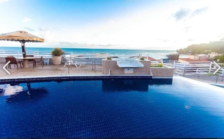View (from property/room), Beach, Pool view, Swimming pool