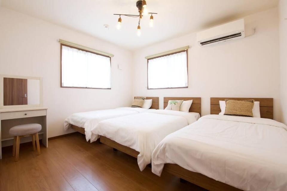 ゲストハウス かなぐすくミント Apartment in Okinawa Prefecture