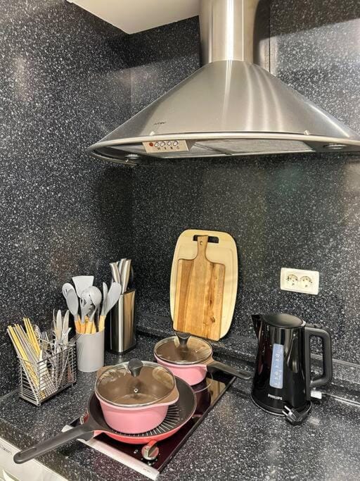 Kitchen or kitchenette, stove