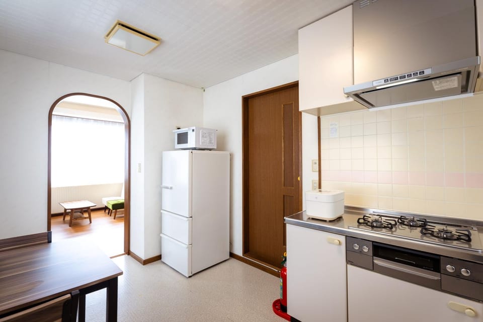 Kitchen or kitchenette, stove