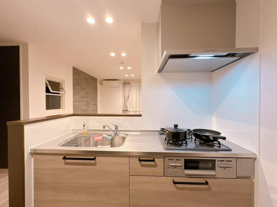 Kitchen or kitchenette, stove