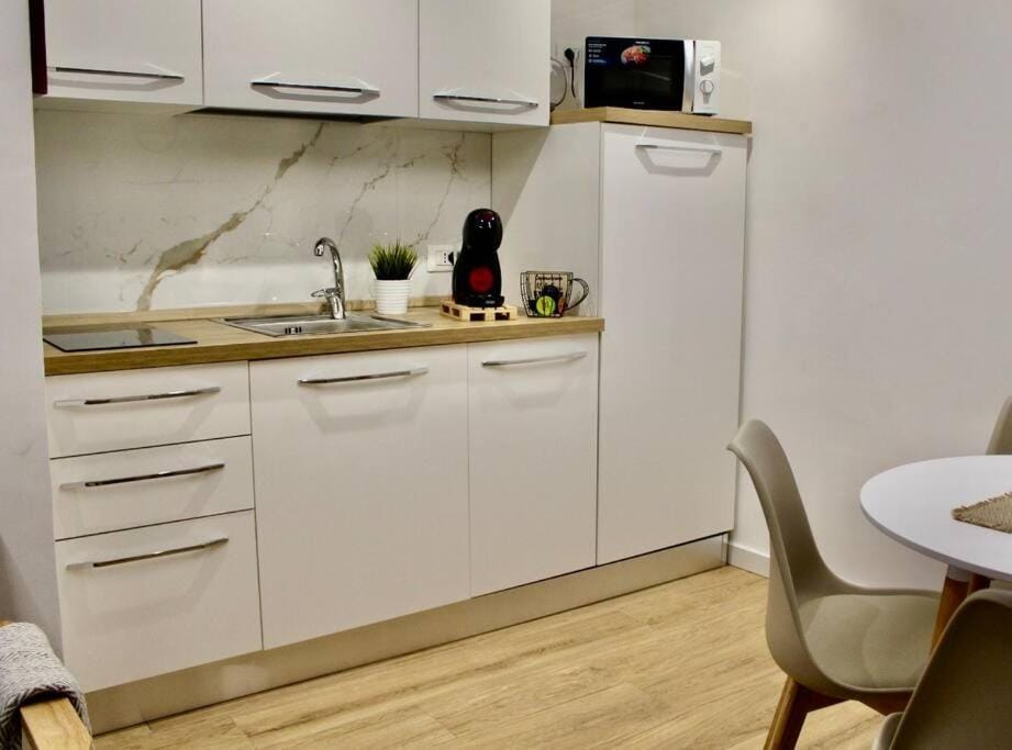Kitchen or kitchenette, stove
